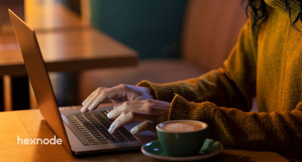 Woman reinstalling macOS in a dimly lit room